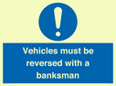 vehicles-must-be-reversed-with-a-banksman~